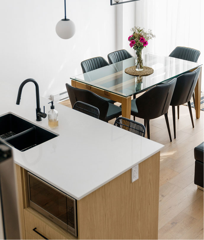 Cuisine moderne aire ouverte avec îlot au projet immobilier Norcité de Mirabel - Habita Nord-Est