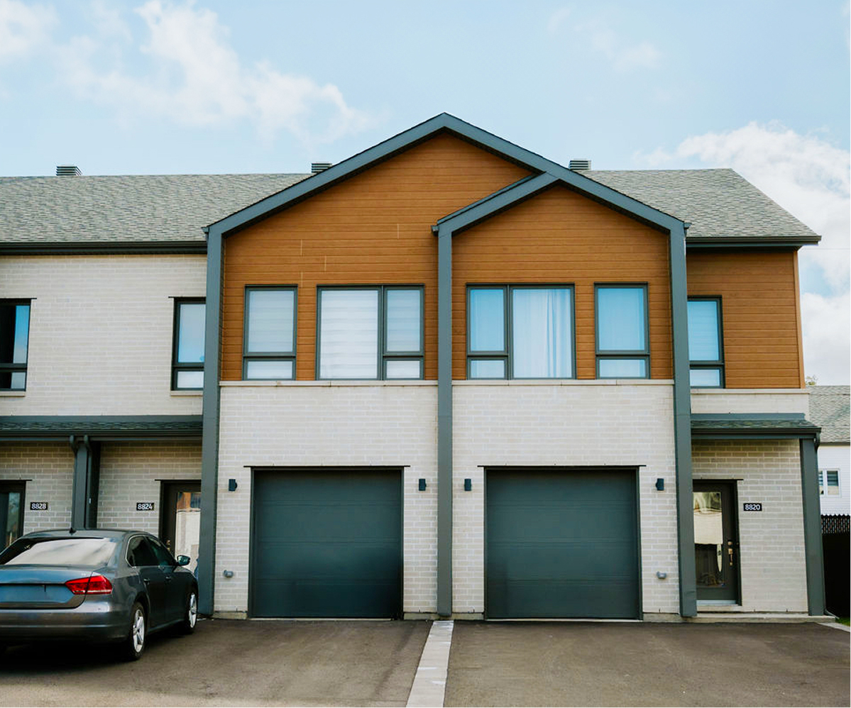 Façade de maisons de ville neuves au projet immobilier Norcité à Mirabel – Habita Nord-Est